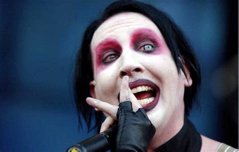 His beard makes him look little rough and a mature. The Truth: Is Marilyn Manson Scarier With Or Without ...