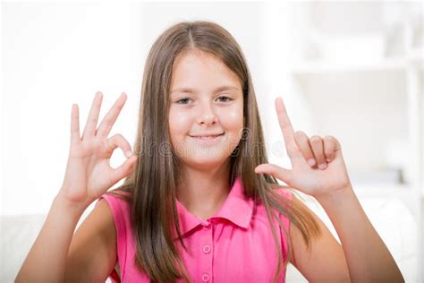 Smiling Deaf Girl Using Sign Language Stock Photo Image Of Deafness
