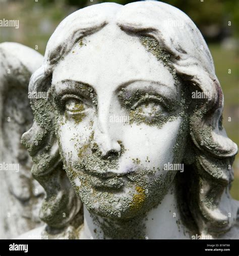Close Up Of Guardian Angel Statue S Face In Graveyard Stock Photo Alamy