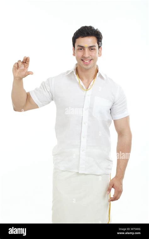 South Indian Man Gesturing Size With His Fingers Stock Photo Alamy