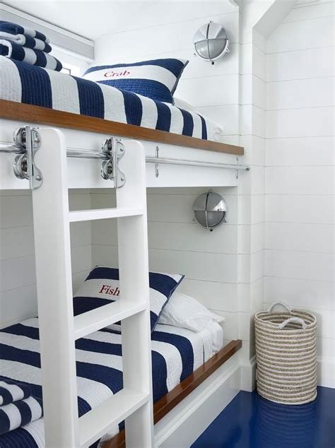 White And Blue Nautical Themed Bunk Room Features Two Toned Built In