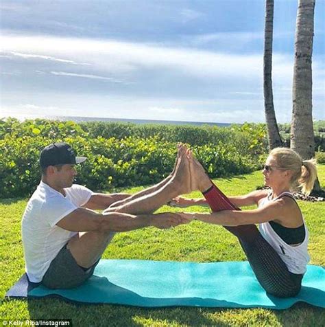 Kelly Ripa And Husband Mark Consuelos Share Acrobatic Kiss During Crazy Workout