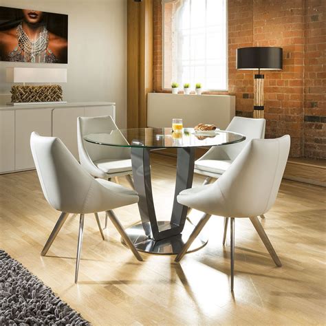 Simply styled, a solid oak cross frame is topped with a sheet of clear tempered glass. Modern Round Glass Top Dining Set Grey Table Base + 4 Ice ...