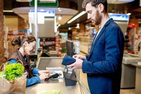 Businessman With Cashier At The Cash Register Stock Image Image Of
