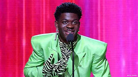 A campaign started last week calling for slim shady to be cancelled. Lil Nas X Wins First American Music Award in Green Suit ...