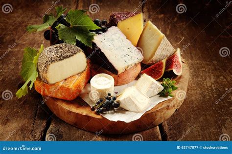 Gourmet Cheese Platter On A Rustic Buffet Stock Image Image Of