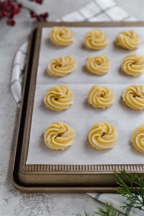 While ooey, gooey and warm is what i crave at this time of the i don't think it was until now that i connected the dots that the delicate sparkly sugar cookies in little paper cups from the big blue tin that i grew up. This Butter Cookie Recipe Tastes Exactly Like The 'Blue ...