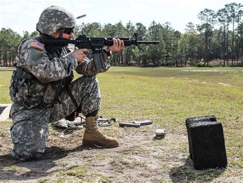 A Brass Casing Ejects From An M4 Carbine Moments After Nara And Dvids