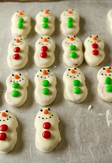 Nutter butters are the ultimate peanut butter cookie — a delicious crunchy peanut butter sandwich cookie! Nutter Butter Snowmen | Brown Eyed Baker