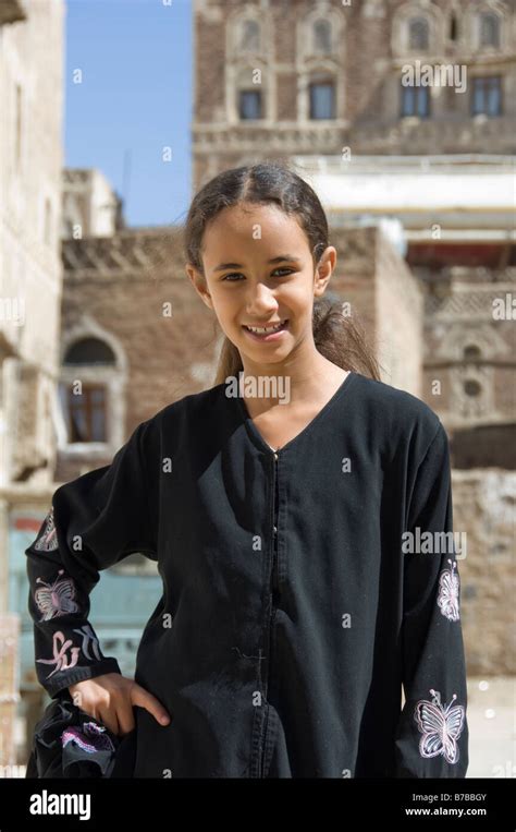 Young Yemeni Girl Posing In The Old Town District Of Sana A Yemen Stock