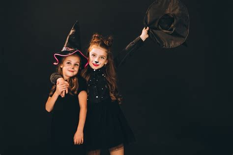Free Photo Group Of Girls Dressed In Halloween Costumes In Studio