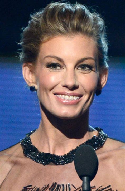Faith Hill Rocks A Metal Mouth To The 2013 Grammys Photo