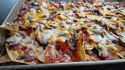 Toss half of a thinly sliced baguette with olive oil, then spread on a baking sheet and bake at 475 degrees f. #FoodieExtravaganza ~ Pizza Nachos