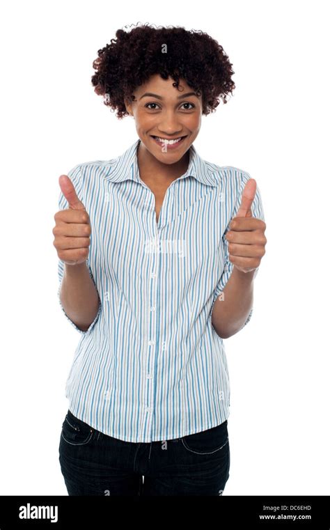 Excited Woman Gesturing Double Thumbs Up Stock Photo Alamy