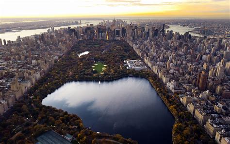 Central park, a sanctuary amidst the bustling concrete jungle of new york city. New York City, Central Park, Cityscape, Lake, Building ...