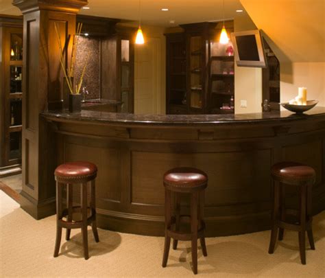 This home bar is located in an historic barn in newtown square, philadelphia. Curved Home Wet Bar Tucks Into Basement Stairwell...
