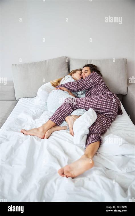 Couple Cuddling In The Bed Hi Res Stock Photography And Images Alamy