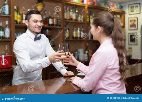 Girl Flirting With Barman At Counter Stock Image Image Of Adults Cheerful 62100973