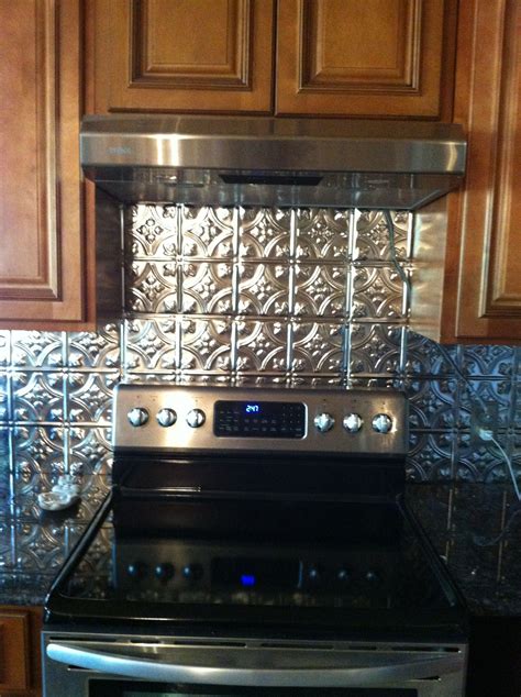 Our kitchen reno glass backsplash behind the gas stove and. Tin backsplash for behind my stove | Backsplash