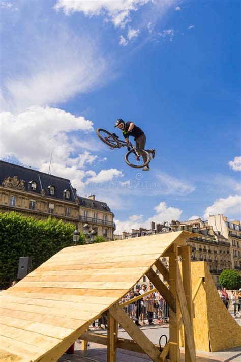 Young Man On Bmx Doing Tricks During A Freestyle Bmx Demonstration In
