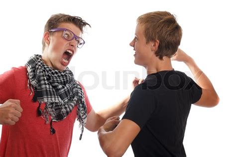 Two Teen Boys Fighting And Screaming At Each Other Stock
