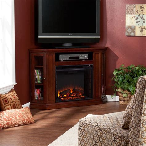 The tv stand can accommodate most tvs up to 70 wide or 120 lbs. Southern Enterprises Carter 48 in. Convertible Media Electric Fireplace TV Stand in Cherry ...