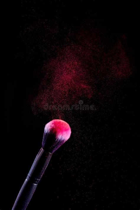Splash Of Powder On A Black Background Brushes For Make Up On A Black