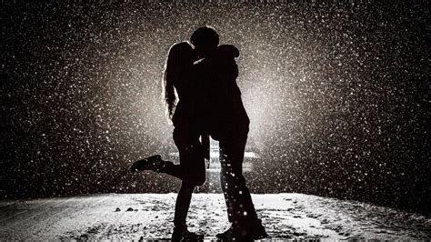 2560x1440 Couple Kissing In Snow Night 1440p Resolution Hd 4k Wallpapers Images Backgrounds