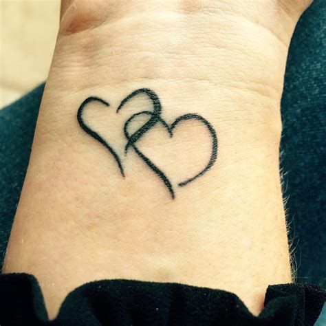 heart tattoo ideas express your love with ink style and fashion trend 2023