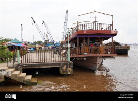Boat Berthed At The Water Front Of Kapuas River In Pontianak Alun