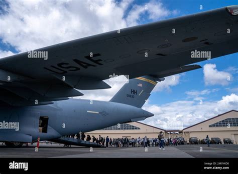 Festival visitors wait in line to tour the C-17 Globemaster III at the