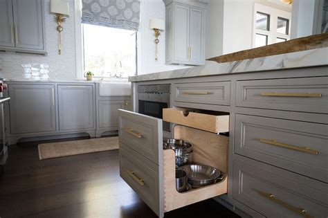 These kitchen islands have a rectangular top, a large front drawer with a raised profile, raised panel doors and deep cabinets. 5 Functional & Eye-Catching Kitchen Island Design Ideas