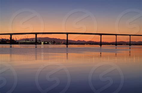 The Sunrise Over The Coronado Bridge In San Diego California By James