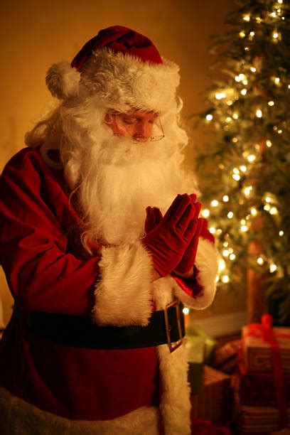 Royalty Free Santa Kneeling Pictures Images And Stock Photos Istock