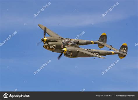 Airplane P 38 Lightning Wwii Fighter Aircraft Flying At The Air Show