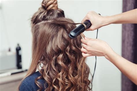 How To Curl Hair With A Straightener Get Salon Quality Curls At Home