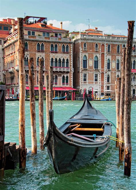 Venetian Typical Boat Gondola In Harbor Photograph By Sebastian Condrea