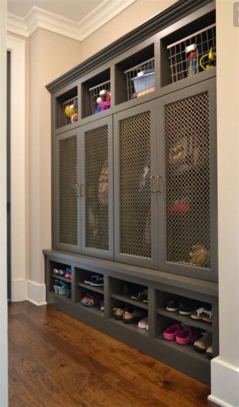 Such a version of a stadium locker provides a practical sturdy and still decorous addition to kids room. Locker style storage | Mudroom laundry room, Mudroom ...