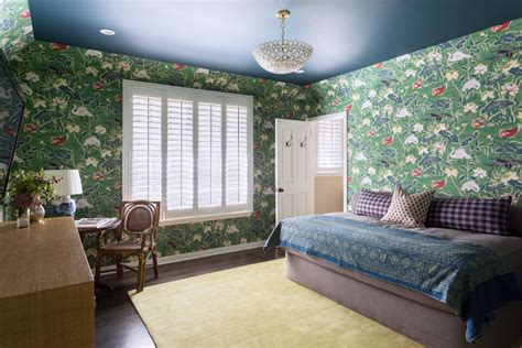Guest Room With Colorful Wallpaper And Textiles Traditional Bedroom