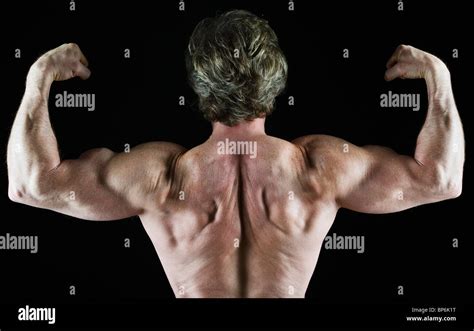 Muscular Man Flexing His Biceps Stock Photo Alamy