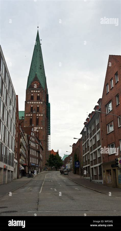Lubeck Germany View Of Street With Old Houses And Cathedral In The