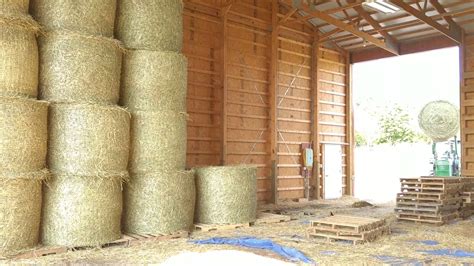 Stacking Round Bales In The Hay Barn Youtube