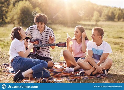 Except maybe a summer vacation. Summer, Vacation, Music And Recreation Time Concept. Cheerful Four Friends Or Classmates Have ...