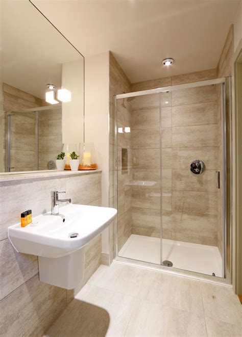 You could forego walls and instead zone the two. Small En Suite Shower Room Ideas : Making the most of a small bathroom in a Loft | Simply Loft ...