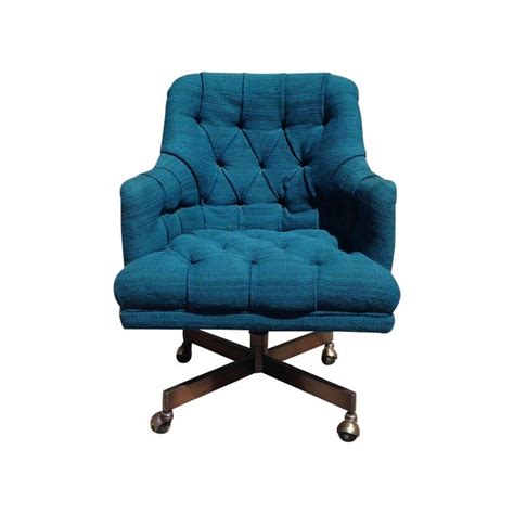 A contemporary update on a classic design, this sofa set anchors any living room or den in transitional style. Oversized Teal Tufted Office Chair | Chairish