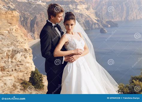 Beautiful Couple Gorgeous Bride In Wedding Dress Posing With Elegant