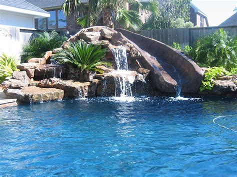 The sound of flowing water exudes a calm and you can flank your ensemble with playful water slides that both children and grown ups would be able. Moss Rock Waterfall with Slide.jpg (800×600) | Pool ...