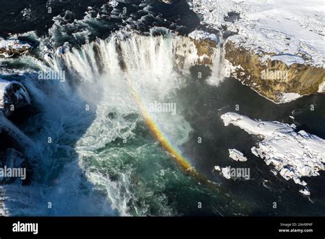 Aerial View Of Godafoss Waterfall Snowy Shore And River Iceland In