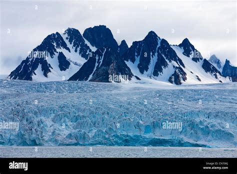 Norway Svalbard Spitsbergen Island Mountain Peaks Rise Above Ice