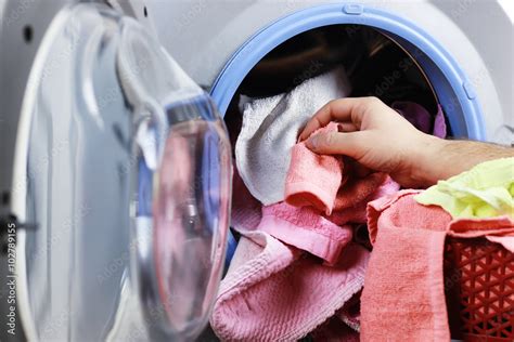 Put Cloth In Washer Stock Photo Adobe Stock